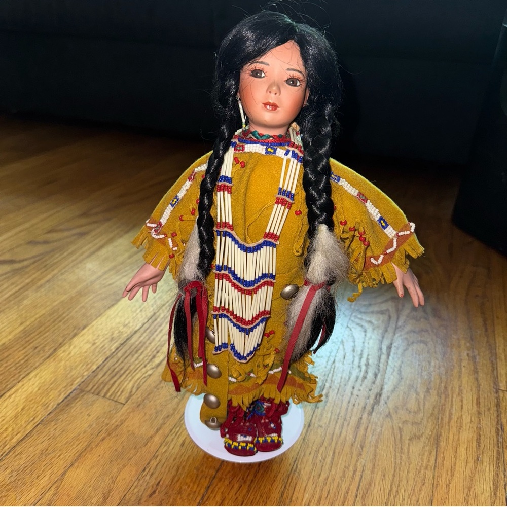 Vintage Native American-Inspired Porcelain Doll with Braided Hair